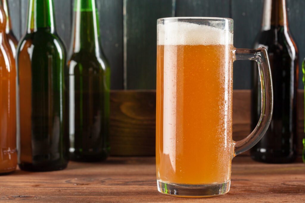 global beverage alcohol forecast 2025 - glass of beer and beer bottles