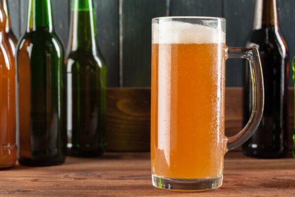 global beverage alcohol forecast 2025 - glass of beer and beer bottles